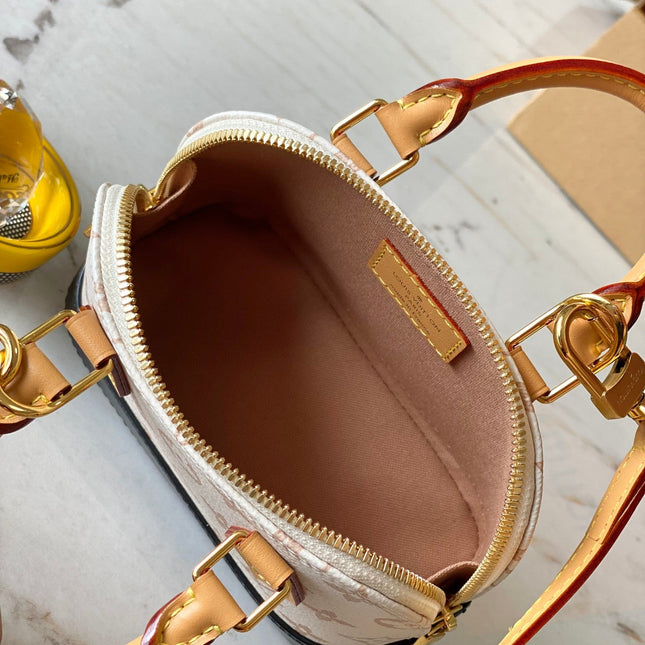 NANO ALMA 18 IN WHITE MONOGRAM DUNE CANVAS GOLD HARDWARE