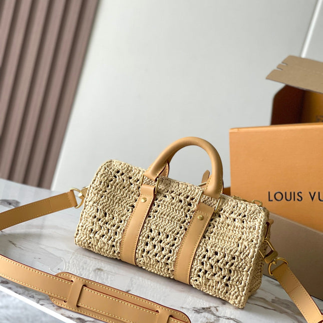 KEEPALL BANDOULIÈRE 25 IN BEIGE CROCHETED RAFFIA AND CALFSKIN TRIM