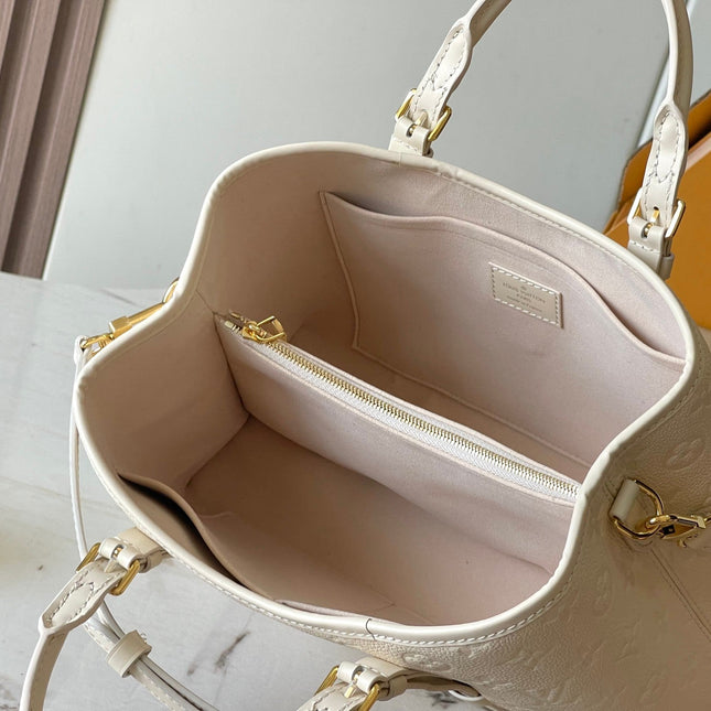 BABYLONE TOTE 31 IN WHITE MONOGRAM EMPREINTE LEATHER