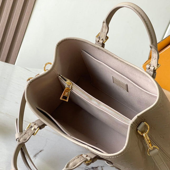 BABYLONE TOTE 31 IN TOURTERELLE MONOGRAM EMPREINTE LEATHER