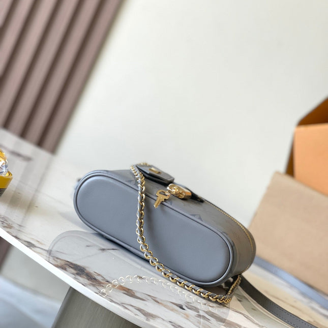VANITY CHAIN POUCH 19 IN TRIANON MONOGRAM CALFSKIN GOLD BUCKLE