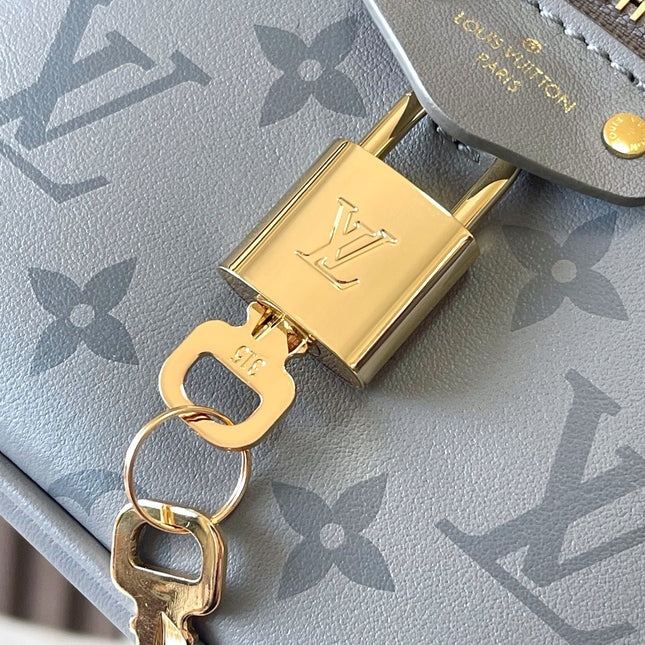 VANITY CHAIN POUCH 19 IN TRIANON MONOGRAM CALFSKIN GOLD BUCKLE