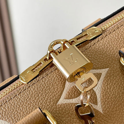 SPEEDY BANDOULIÈRE 20 IN MILK TEA MONOGRAM EMPREINTE LEATHER
