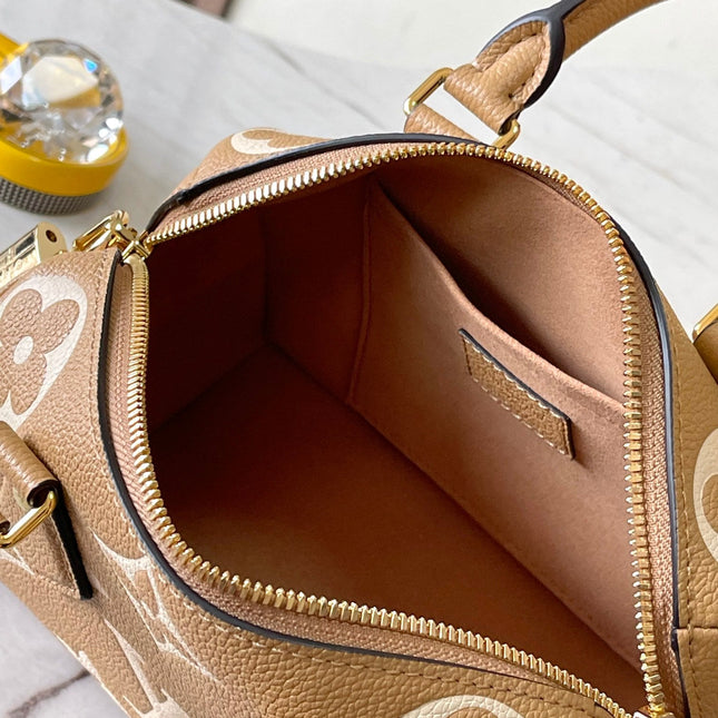 SPEEDY BANDOULIÈRE 20 IN MILK TEA MONOGRAM EMPREINTE LEATHER