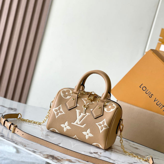 SPEEDY BANDOULIÈRE 20 IN MILK TEA MONOGRAM EMPREINTE LEATHER