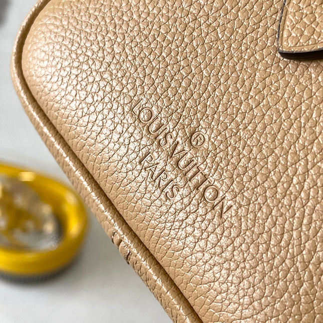SPEEDY BANDOULIÈRE 20 IN MILK TEA MONOGRAM EMPREINTE LEATHER
