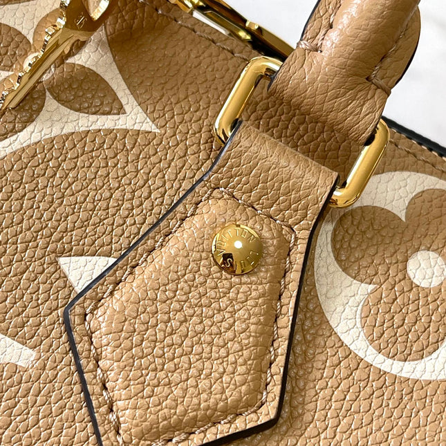 SPEEDY BANDOULIÈRE 20 IN MILK TEA MONOGRAM EMPREINTE LEATHER