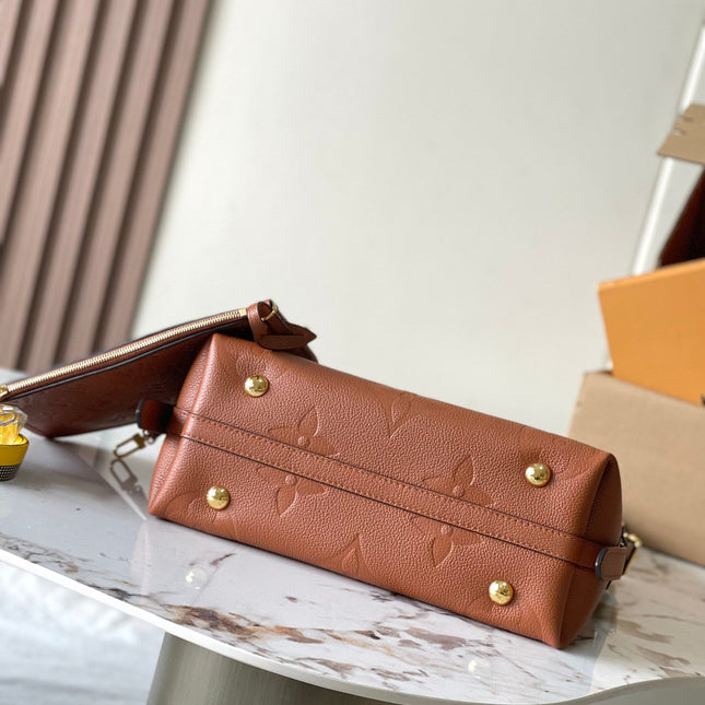 CARRYALL PM 29 IN COGNAC MONOGRAM EMPREINTE LEATHER GOLD LOGO