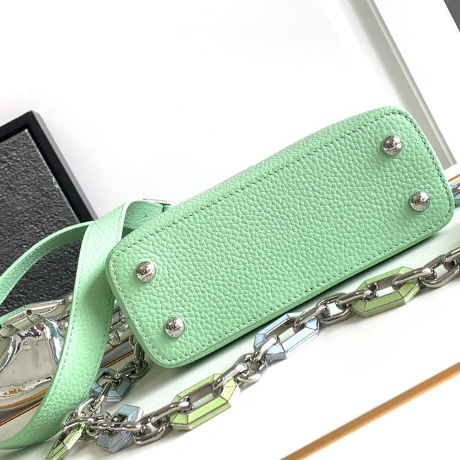 CAPUCINES MINI 21 IN LIGHT GREEN TAURILLON SILVER HARDWARE