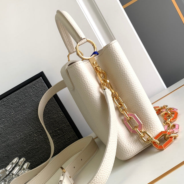 CAPUCINES BB 27 IN PEARL WHITE TAURILLON GOLD HARDWARE