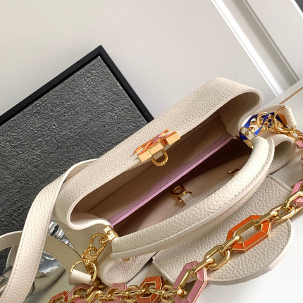 CAPUCINES BB 27 IN PEARL WHITE TAURILLON GOLD HARDWARE