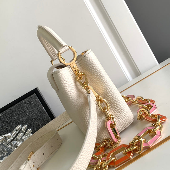 CAPUCINES MINI 21 IN PEARL WHITE TAURILLON GOLD HARDWARE