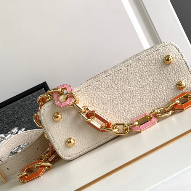 CAPUCINES MINI 21 IN PEARL WHITE TAURILLON GOLD HARDWARE