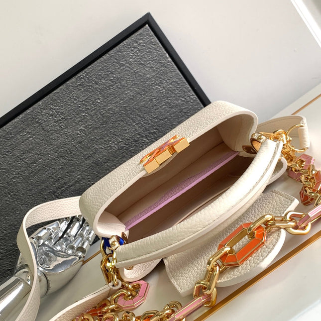 CAPUCINES MINI 21 IN PEARL WHITE TAURILLON GOLD HARDWARE