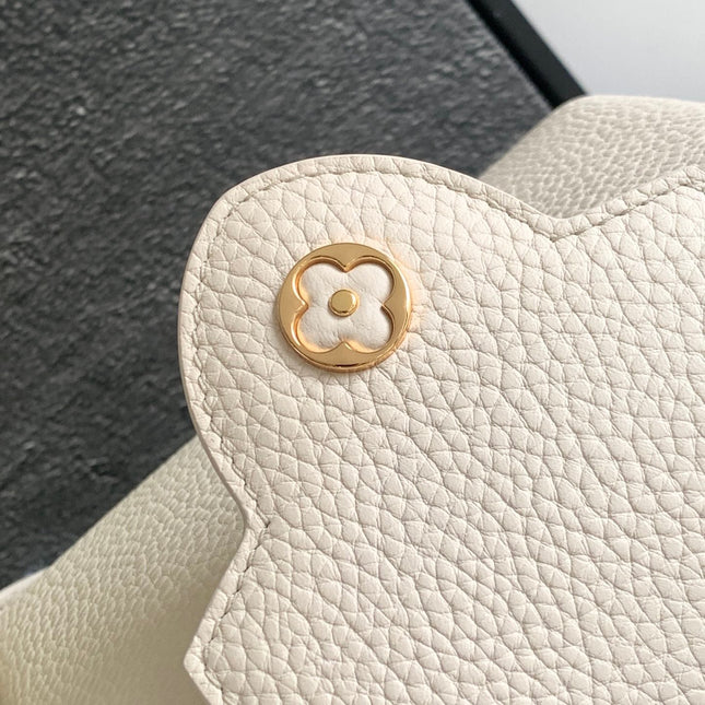 CAPUCINES MINI 21 IN PEARL WHITE TAURILLON GOLD HARDWARE