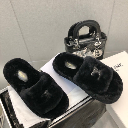 THICK-SOLED SLIPPER IN BLACK LAMB FUR