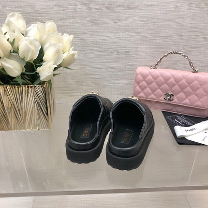 CC TURNLOCK FLAP MULES BLACK LAMBSKIN