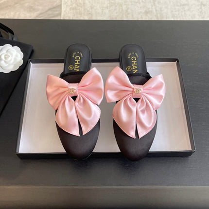BIG BOW FLAT MULE SANDALS IN BLACK MIX PALE PINK SILK