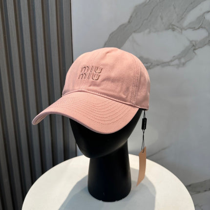 MM BASEBALL CAP IN PEACHY PINK FABRIC BRAND EMBROIDERY