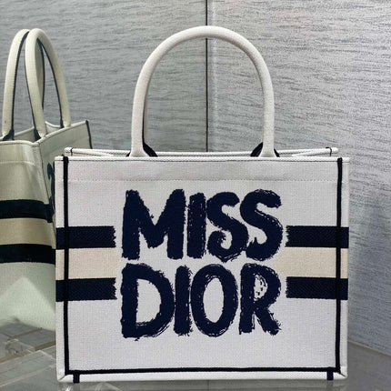 MEDIUM BOOK TOTE 36 IN WHITE MIX BLACK CANVAS 226504