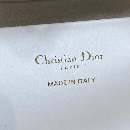 DIOR 25S TOUJOURS VERTICAL TOTE BAG 18 IN IVORY CALFSKIN WITH CHARM BRACELET STRAP