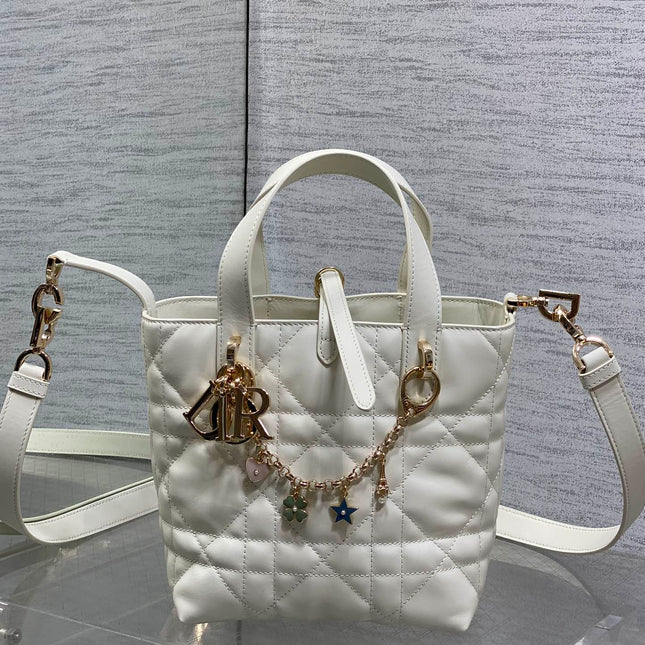 DIOR 25S TOUJOURS VERTICAL TOTE BAG 18 IN IVORY CALFSKIN WITH CHARM BRACELET STRAP