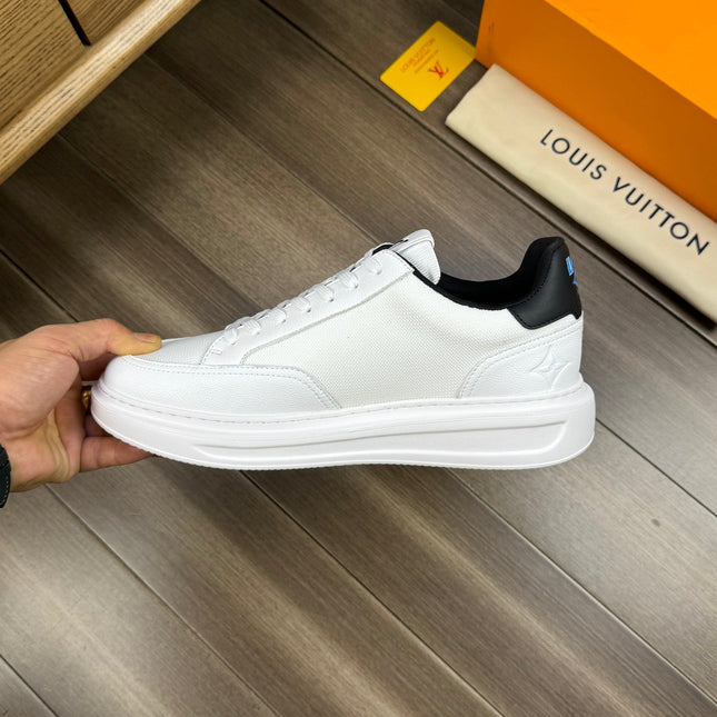 LV TRAINER SNEAKER WHITE AND BLACK CALFSKIN AND BREATHABLE FABRIC