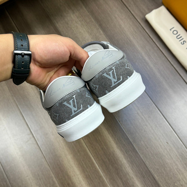 LV TRAINER SNEAKER IN ASH GREY MONOGRAM DENIM