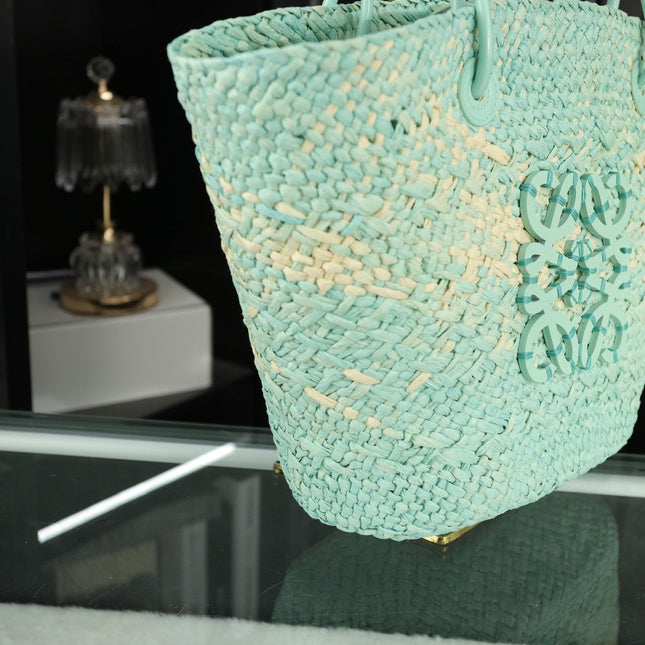 LOE SMALL ANAGRAM BASKET 28 BAG IN LIGHT BLUE IRACA PALM AND CALFSKIN