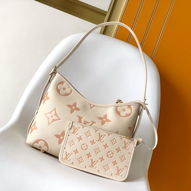 CARRYALL PM 29 BAG IN BEIGE MIX PINK MONOGRAM EMPREINTE LEATHER