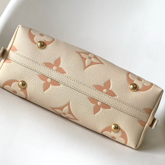 CARRYALL PM 29 BAG IN BEIGE MIX PINK MONOGRAM EMPREINTE LEATHER