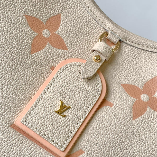 CARRYALL PM 29 BAG IN BEIGE MIX PINK MONOGRAM EMPREINTE LEATHER