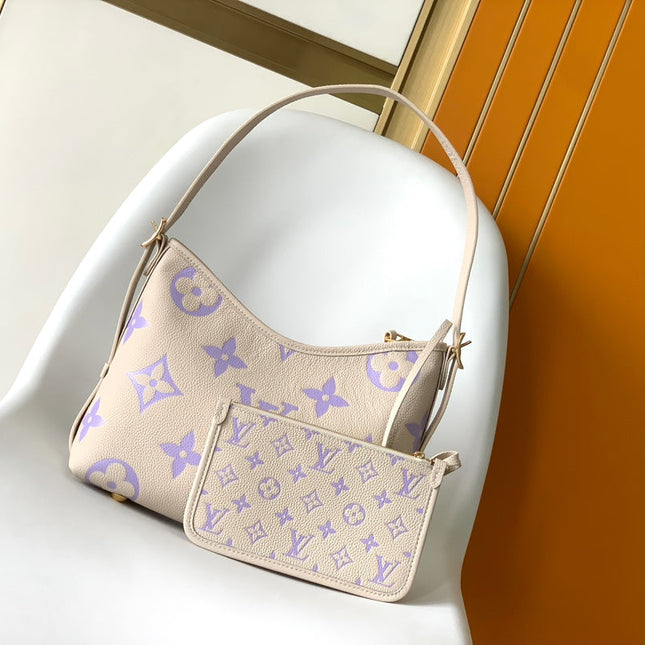 CARRYALL PM 29 BAG IN BEIGE MIX PURPLE MONOGRAM EMPREINTE LEATHER