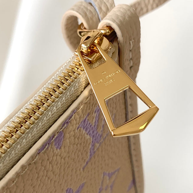 CARRYALL PM 29 BAG IN BEIGE MIX PURPLE MONOGRAM EMPREINTE LEATHER