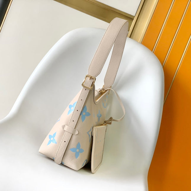 CARRYALL PM 29 BAG IN BEIGE MIX BLUE MONOGRAM EMPREINTE LEATHER