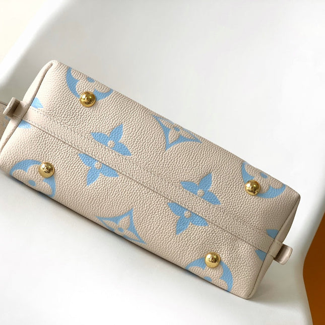 CARRYALL PM 29 BAG IN BEIGE MIX BLUE MONOGRAM EMPREINTE LEATHER