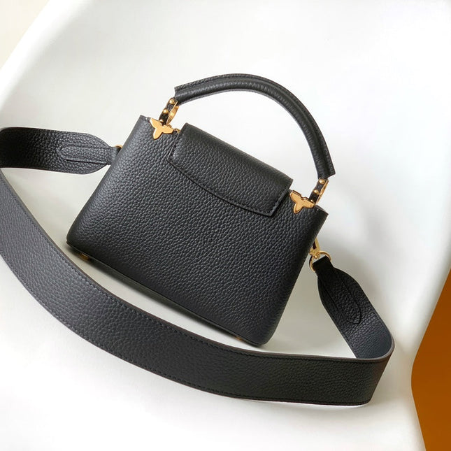 CAPUCINES MM BAG 21 IN BLACK TAURILLON COWHIDE GOLD HARDWARE