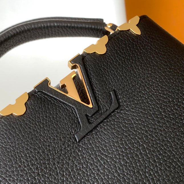 CAPUCINES MM BAG 21 IN BLACK TAURILLON COWHIDE GOLD HARDWARE
