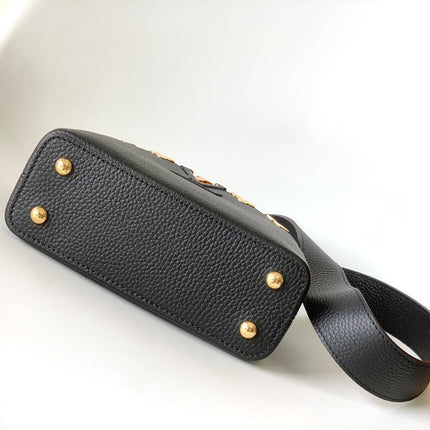 CAPUCINES MM BAG 21 IN BLACK TAURILLON COWHIDE GOLD HARDWARE