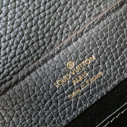 CAPUCINES MM BAG 21 IN BLACK TAURILLON COWHIDE GOLD HARDWARE