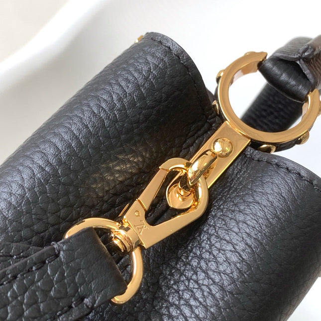 CAPUCINES MM BAG 21 IN BLACK TAURILLON COWHIDE GOLD HARDWARE