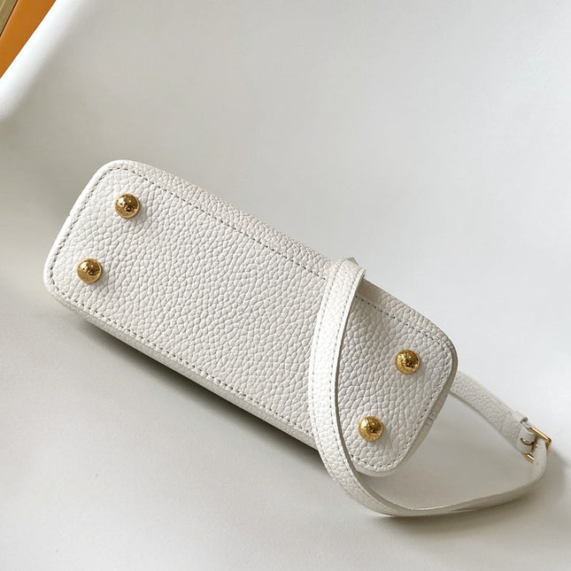 CAPUCINES EAST-WEST MINI 21 IN WHITE TAURILLON LEATHER GOLD-TONE HARDWARE