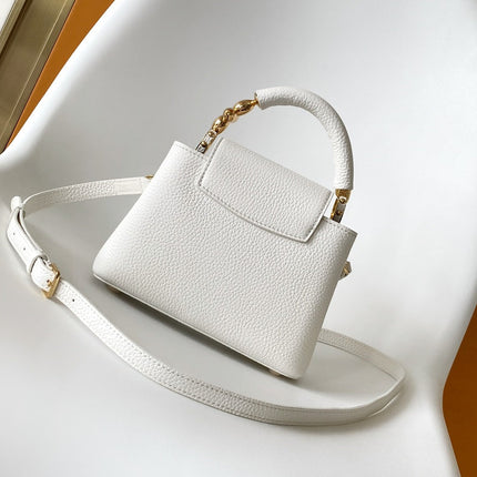 CAPUCINES EAST-WEST MINI 21 IN WHITE TAURILLON LEATHER GOLD-TONE HARDWARE