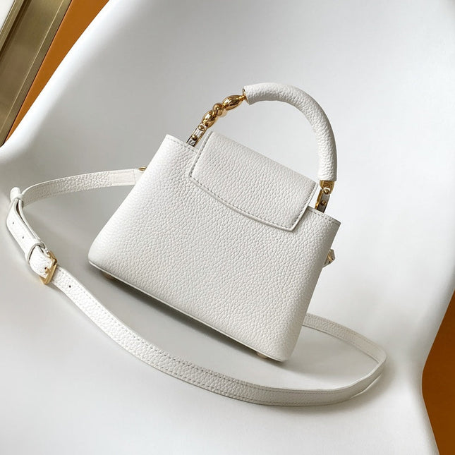 CAPUCINES EAST-WEST MINI 21 IN WHITE TAURILLON LEATHER GOLD-TONE HARDWARE