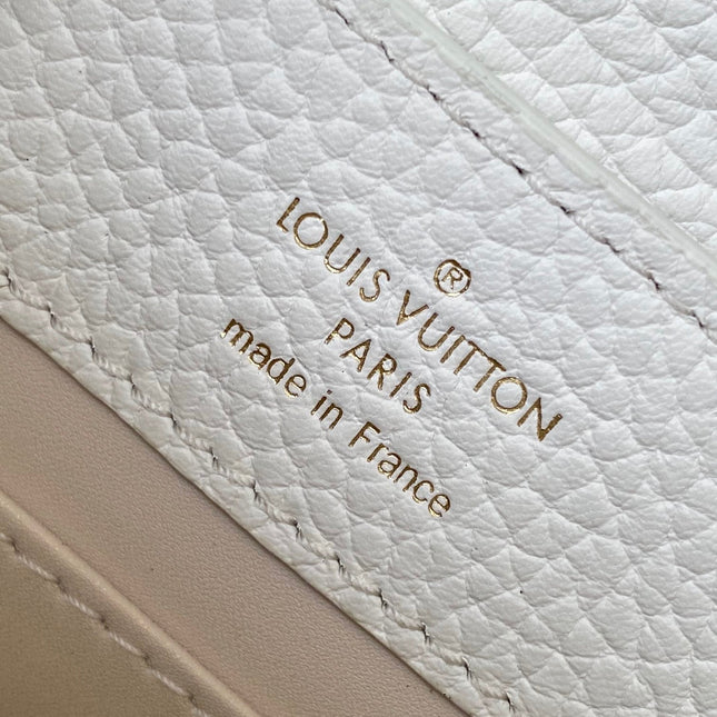 CAPUCINES EAST-WEST MINI 21 IN WHITE TAURILLON LEATHER GOLD-TONE HARDWARE