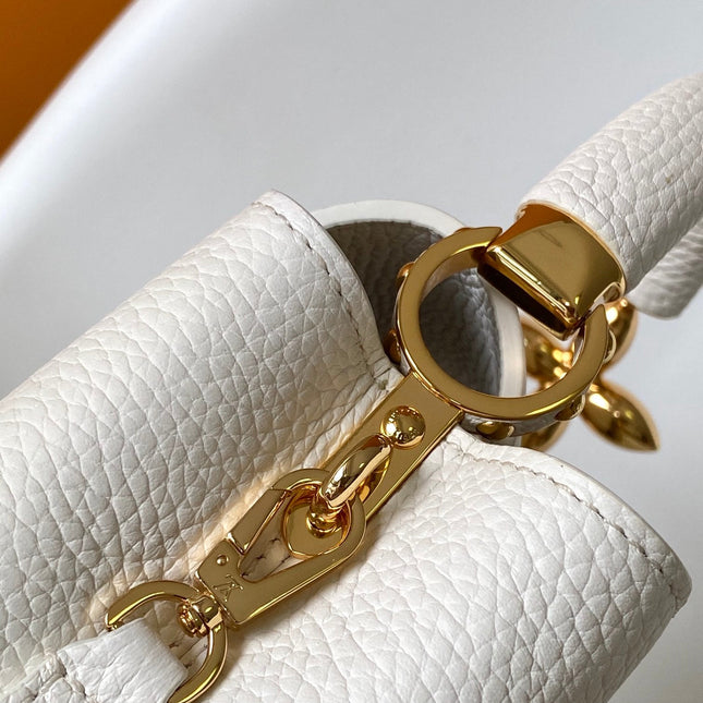 CAPUCINES EAST-WEST MINI 21 IN WHITE TAURILLON LEATHER GOLD-TONE HARDWARE