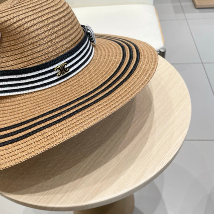 WIDE BRIM HAT MODEL 650410 IN BROWN WITH BLACK STRIPES WOVEN STRAW
