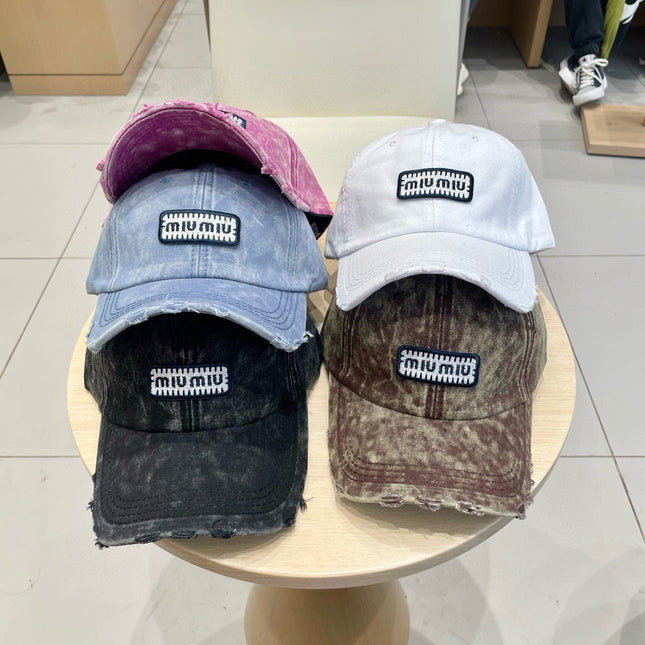 MM DISTRESSED FABRIC BASEBALL CAP IN WHITE WITH EMBROIDERED LOGO