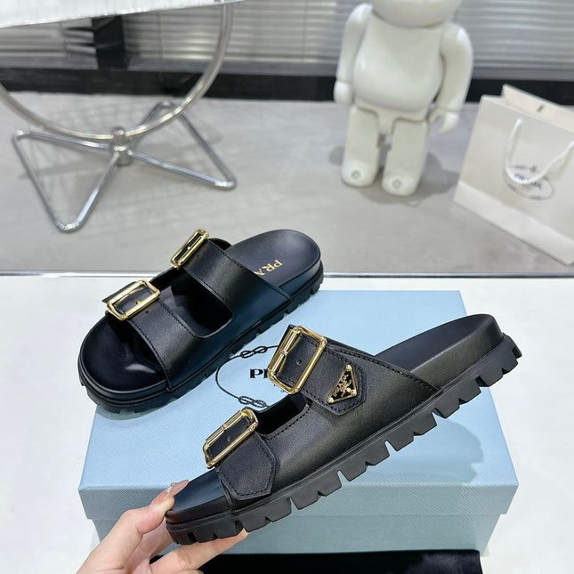 PRADA 25S STRAP SLIDES 30MM IN BLACK CALFSKIN GOLD HARDWARE