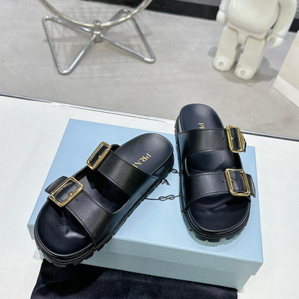 PRADA 25S STRAP SLIDES 30MM IN BLACK CALFSKIN GOLD HARDWARE